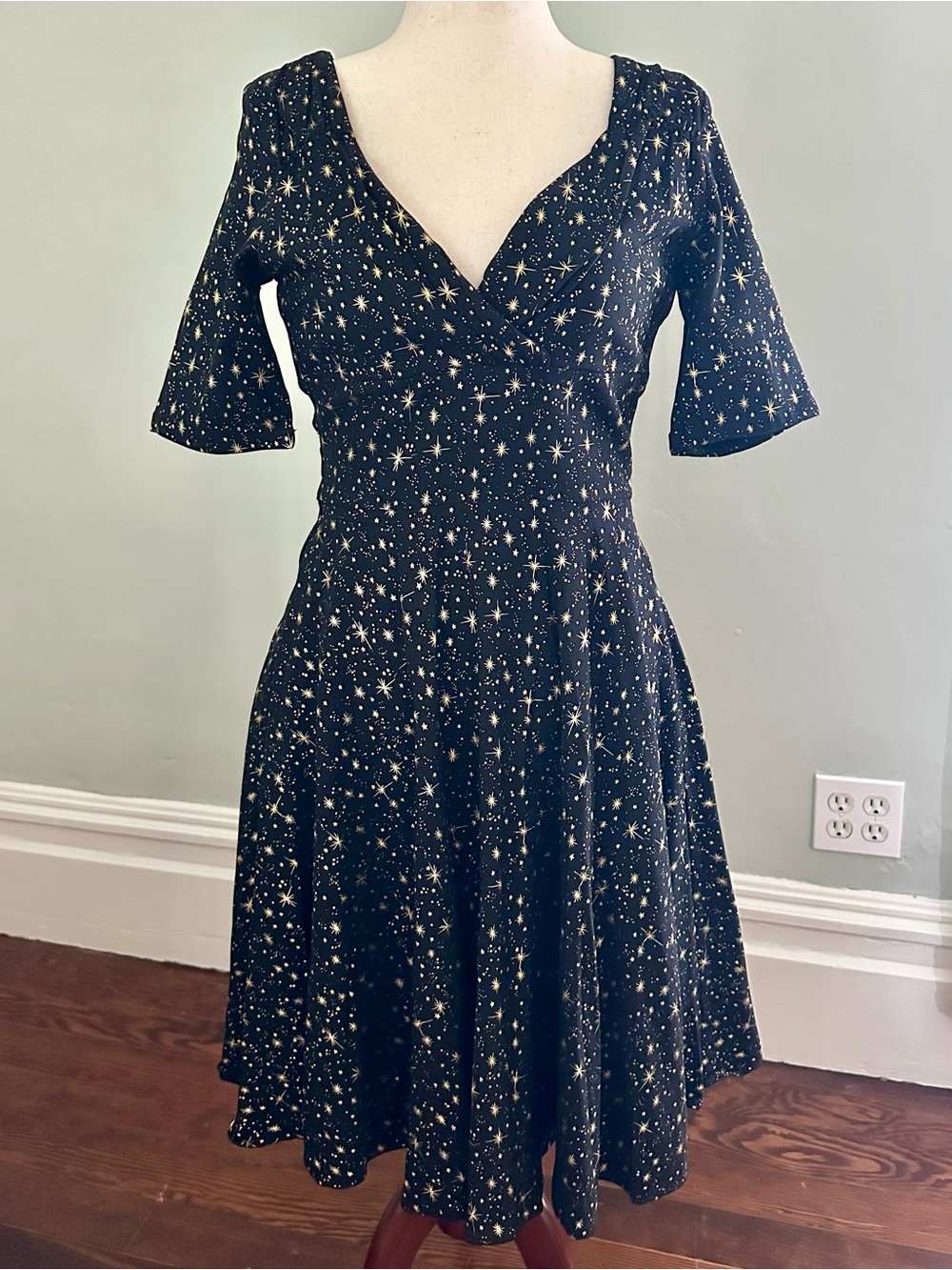 Collectif Trixie Atomic Star Black Midi Dress with Gold Star Print